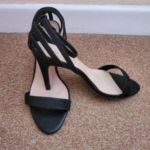 Women's Black and Silver Courts